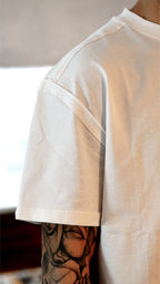 T-shirt boxy fit off-white unisex in cotone pesante con cuciture a rovescio a vista Empyrom