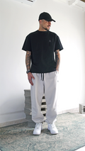T-shirt boxy fit nera unisex in cotone con cuciture a rovescio esposte Empyrom